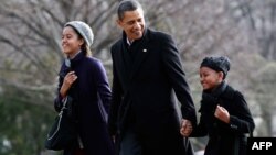 Барак Обама с дочерьми
