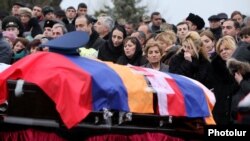 Armenia - The state funeral of the three crew members of an Armenian military helicopter shot down near Nagorno-Karabakh, Yerevan, 25Nov2014.