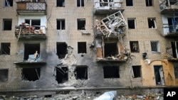 Пошкоджений обстрілами житловий будинок у Херсоні, травень 2024 року