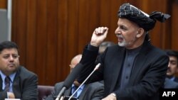 Afghan President Ashraf Ghani speaks as he introduces his cabinet nominees to parliament in Kabul on January 20.