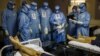 Medics wearing personal protective equipment work in the intensive care unit for COVID-19 patients in the Moscow Sklifosovsky emergency hospital on October 20.