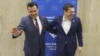 Greek Prime Minister Alexis Tsipras (right) meets with Macedonian Prime Minister Zoran Zaev at the EU-Western Balkans summit in Sofia on May 17.