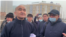 Kazakh activist activist Maks Boqaev (left) with supporters in Atyrau following his release from prison on February 4. 