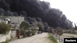 Сирия - Хомсту каптаган кара түтүн, 15-февраль, 2012.