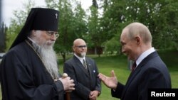 Путин и архиепископ Алексий