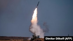 A rocket is launched from a S-400 missile system at the Ashuluk military base in southern Russia during the Caucasus-2020 military drills in September 2020.