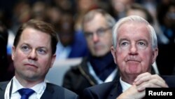 Craig Reedie (right), president of the World Anti-Doping Agency (WADA), and Olivier Niggli, WADA's director-general 