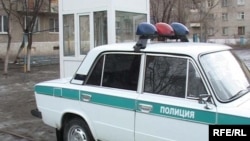 Казак полициясынын машинеси