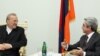 Armenia -- President Serzh Sarkisian (R) meets with Iranian Foreign Minister Manuchehr Mottaki in Yerevan, 27Jan2010