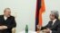 Armenia -- President Serzh Sarkisian (R) meets with Iranian Foreign Minister Manuchehr Mottaki in Yerevan, 27Jan2010