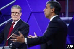 Лідар галоўнай апазыцыйнай Лейбарысцкай партыі Вялікабрытаніі Кейр Стармэр і лідэр Кансэрватыўнай партыі Рышы Сунак, 26 чэрвеня 2024