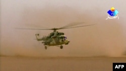 Алжирдин аба күчтөрүнө тиешелүү Mi-8 тик учактары барымтадагылар кармалган аймакта, 18.01.2013