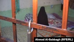 Заключенная в иракской тюрьме. Иллюстративное фото.