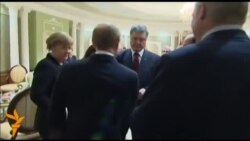 Путин менен Порошенконун учурашуусу