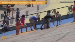 На Оболоні малюють кримськотатарський прапор