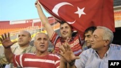 ARMENIA - Turkish national football team fans watch a pre-game training session in Yerevan on September 5, 2008. 