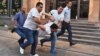 Armenia - Plainclothes police officers arrest a protester on Marshal Bagramian Avenue, Yerevan, 23Jun2015.