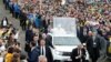 Pope Francis waves as he arrives at the Marian Shrine in Sumuleu Ciuc on June 1. 