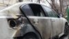The burned-out car of Esenghazy Quandyq in Almaty