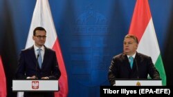 Both Polish Prime Minister Mateusz Morawiecki (left) and his Hungarian counterpart Viktor Orban (right) have expressed misgivings about the upcoming summit. (file photo)