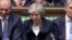 London, Britain - Prime Minister Theresa May / Prime Minister Theresa May sits down in Parliament after the vote on May's Brexit deal, in London, Britain, January 15, 2019 in this screengrab taken from video. Reuters TV via REUTERS