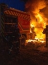 A Ukrainian firefighter attempts to extinguish a blaze that destroyed a fire truck on November 24.<br><br>Ukraine's State Emergency Service claimed the vehicle was struck by a Russian drone as firefighters were responding to the aftermath of a strike on the northeastern city of Sumy.