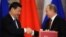 Қытай төрағасы Си Цзиньпин (сол жақта) мен Ресей президенті Владимир Путин. Мәскеу, 22 наурыз 2013 жыл.