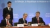 Прем'єр-міністр Грузії Іраклі Гарібашвілі, прем'єр-міністр Молдови Юрій Лянке і президент України Петро Порошенко під час підписання Угоди про асоціацію з ЄС, Брюссель, 27 червня 2014 року