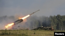 Russia -- A Russian TOS-1A multiple rocket launcher fires during the opening of the Army-2015 international military forum in Kubinka, outside Moscow, June 16, 2015