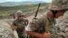 Nagorno-Karabakh -- Armenian soldiers of the self-proclaimed republic of Nagorno-Karabagh walk in a trench at the frontline on the border with Azerbaijan near the northeastern town of Martakert, 06Jul2012