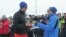 Armenia - Piotr Switalski (R), head of the EU Delegation in Armenia, awards a participant of an EU-sponsored cross-country ski festival in Ashotsk, 4 February 2018.