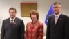 EU foreign-policy chief Catherine Ashton (center) meets with the prime ministers of Kosovo and Serbia, Hashim Thaci (right) and Ivica Dacic, in Brussels last month.