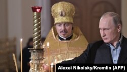 Ռուսաստան - Նախագահ Վլադիմիր Պուտինը Սանկտ Պետերբուրգում Սուրբ Ծննդյան պատարագի ժամանակ, 7-ը հունվարի, 2018թ․