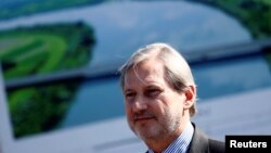 EU Enlargement Commissioner Johannes Hahn attends the opening ceremony of an EU-funded cross-border bridge in Donji Svilaj, Bosnia-Herzegovina, in March.