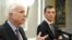 U.S. Senator John McCain (left) speaks during a joint press conference with Montenegrin Defense Minister Predrag Boskovic in Podgorica on April 12.
