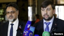 Денис Пушилін (п) і Владислав Дейнего