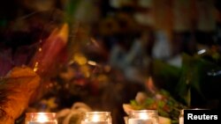 Свічки запалені в честь тих, хто захинув під час вибухів у Бостоні, 21 квітня 2013 року