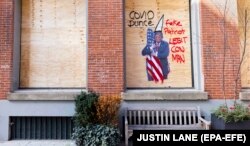 Анти-трамповское граффити в день выборов в нью-йоркском районе Сохо