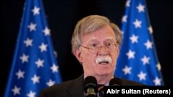 Жон Болтон.