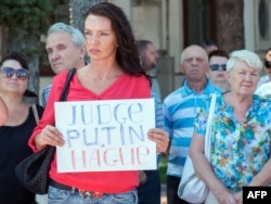 Харьковта мәетләрне Нидерландка озатканда ачу һәм кайгы