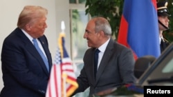 U.S. President Donald Trump welcomes Armenia's Prime Minister Nikol Pashinyan to the White House in Washington, August 8, 2025.