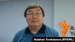 Зайнидин Курманов.