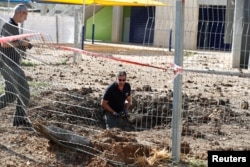 Поліцейські на місці обстрілу в Кір'ят-Ґаті, Ізраїль, 4 травня 2019 року