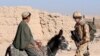 Принц (справа) и ишак. Где-то в Афганистане в начале XXI века