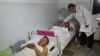 KYRGYZSTAN -- A doctor attends wounded soldiers in a hospital in the Kyrgyzstan's southwestern town of Batken, May 3, 2021