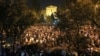 Supporters of Armenian Prime Minister Nikol Pashinian protest outside the parliament building in Yerevan.