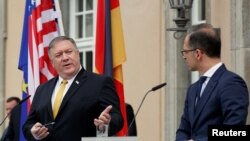 Майк Помпео (л) і Гайко Маас (п) повідомили на прес-конференції, що обговорили й Україну, Берлін, 31 травня 2019 року