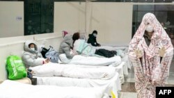 Չինաստան-Մեկուսացված քաղաքացիները գտնվում հիվանդանոցի վերածված ցուցասրահում, 5 փետրվարի, 2020թ.