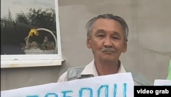 Амангелді Оразбаев.