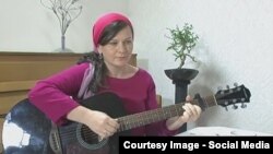 Саитова Луиза